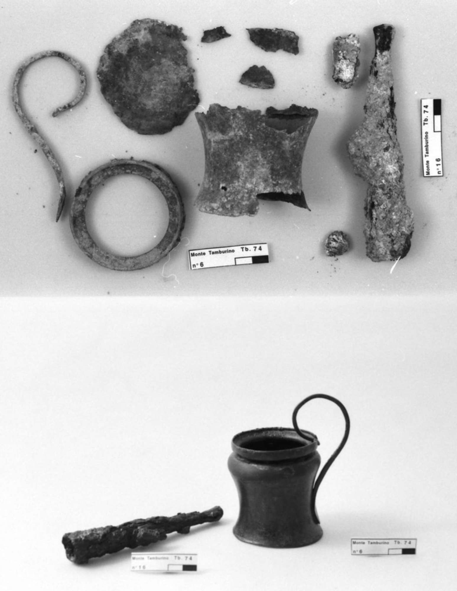 kyathos a rocchetto in bronzo, puntale massiccio in ferro prima del restauro